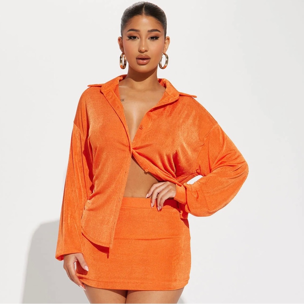 Orange long sleeve top with matching mini skirt from Fashionnova